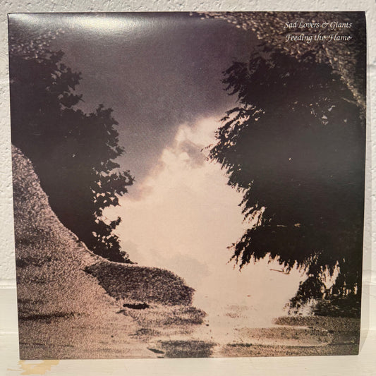 Sad Lovers And Giants – Feeding The Flame